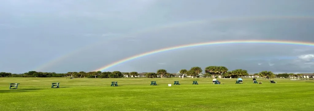 rainbow over golf course