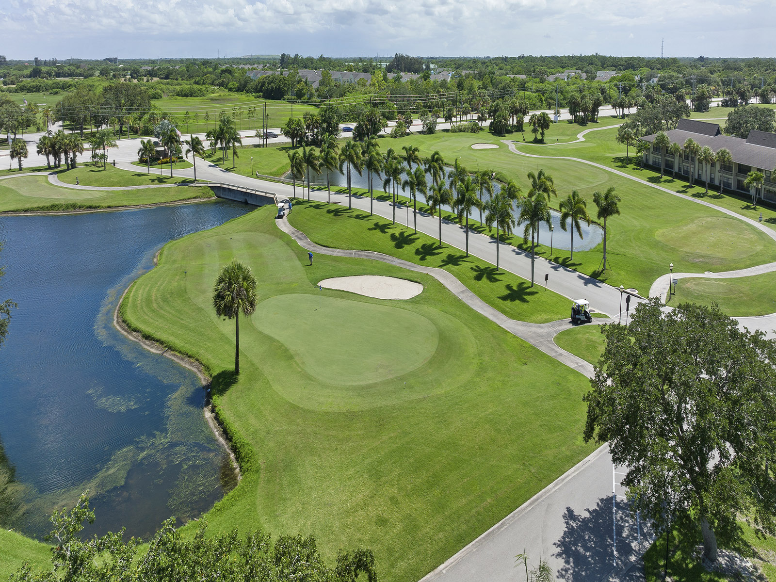 home slider 1 - image of golf course lake